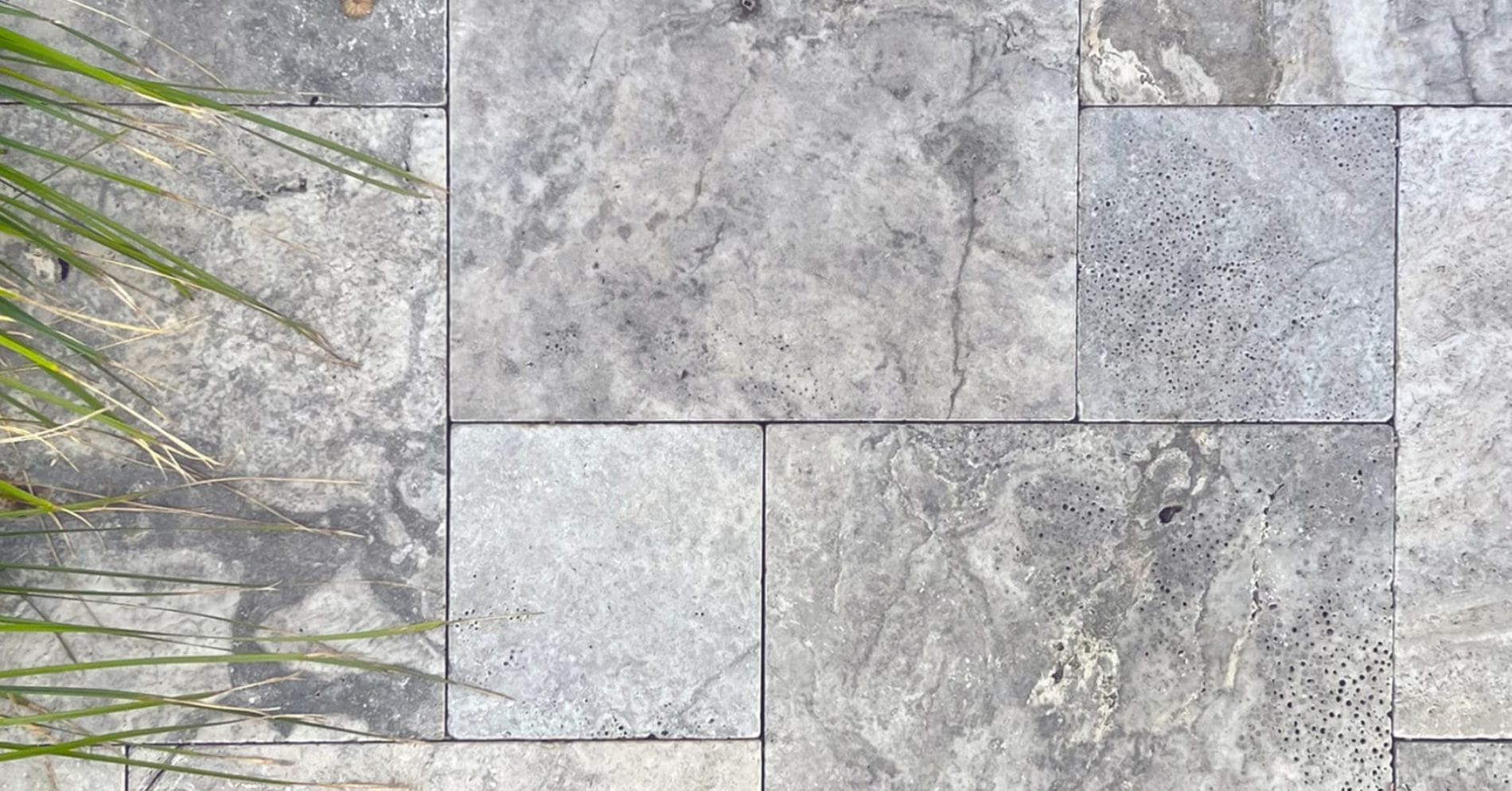 french pattern paving
- close up with plants on the side